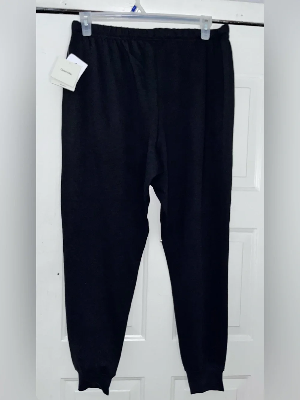 Calvin Klein nwt men’s Black sweats joggers with White Side Logo brand new nwt